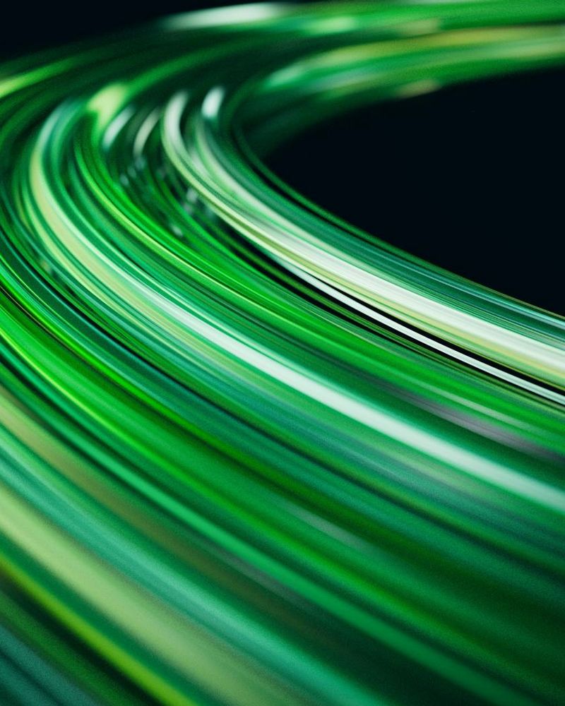Abstract green light waves representing morning energy flow